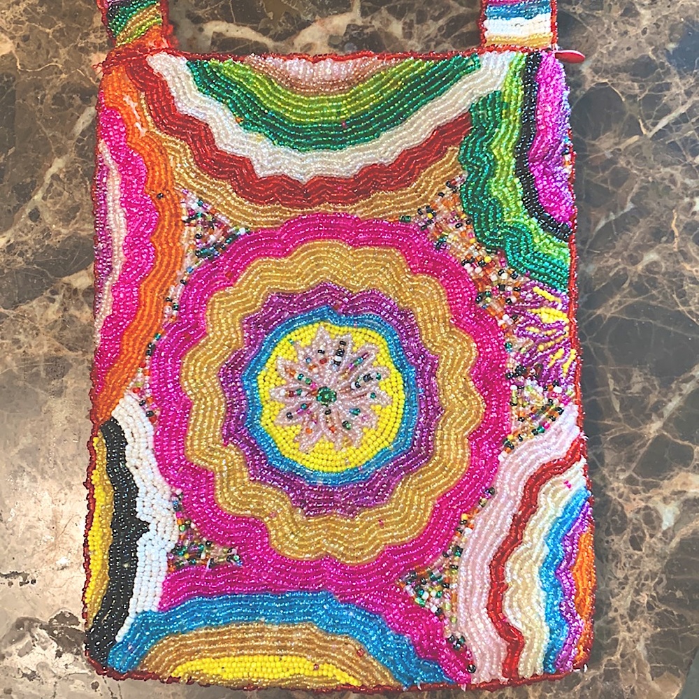 Designer “Christiana” beaded multi colored hand bag.